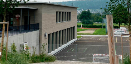 Schulhausumbau und Neubau eines Doppelkindergartens mit Sporthalle