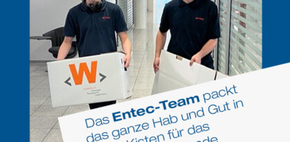 Das Entec Team packt Kisten für den anstehenden Umzug